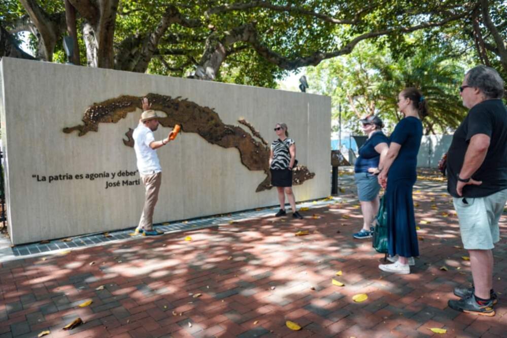 Carved map of Cuba and Jose Marti quote wall in Little Havana, Miami.