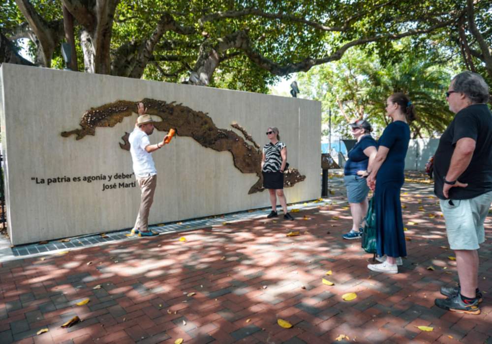Carved map of Cuba and Jose Marti quote wall in Little Havana, Miami.